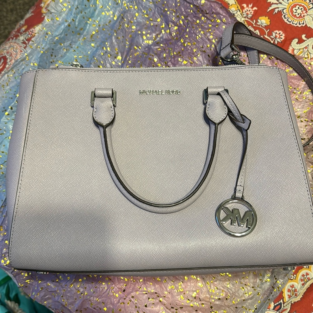 Mk satchel. Beautiful lilac color.Literally brand new without tags